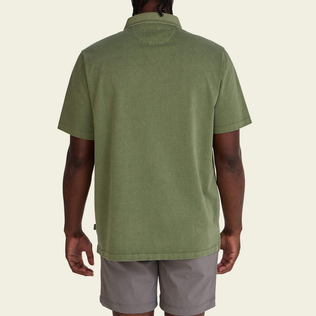 solid cotton polo in Jungle, worn on model